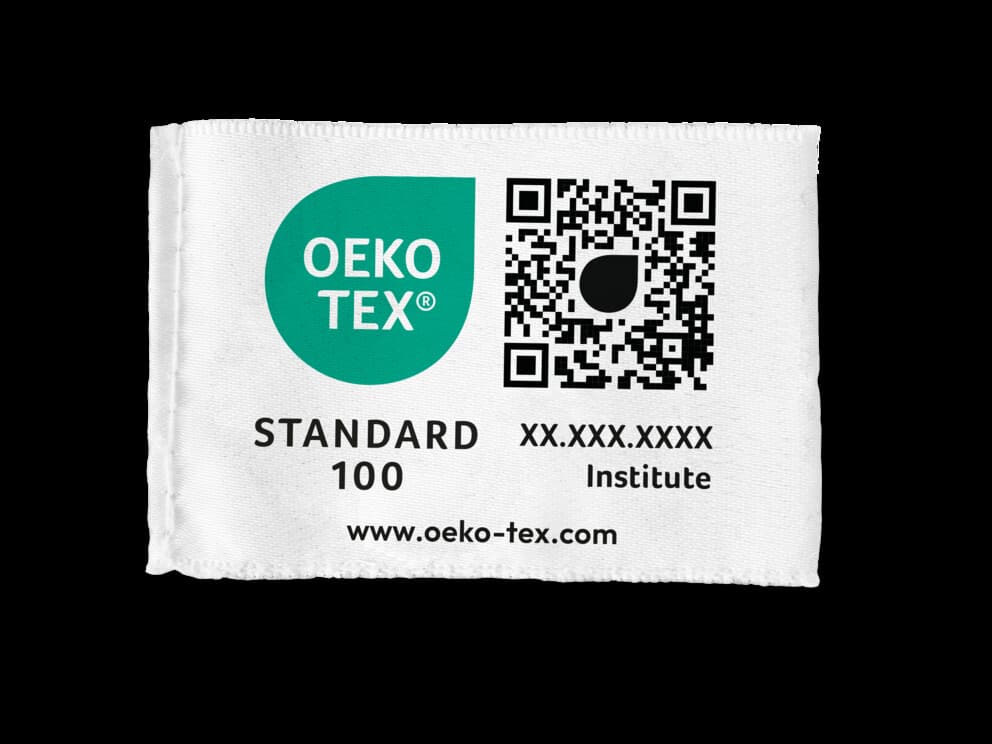 An OEKO-TEX ® STANDARD 100 certification label with its logo, QR code, and website synqworkwear